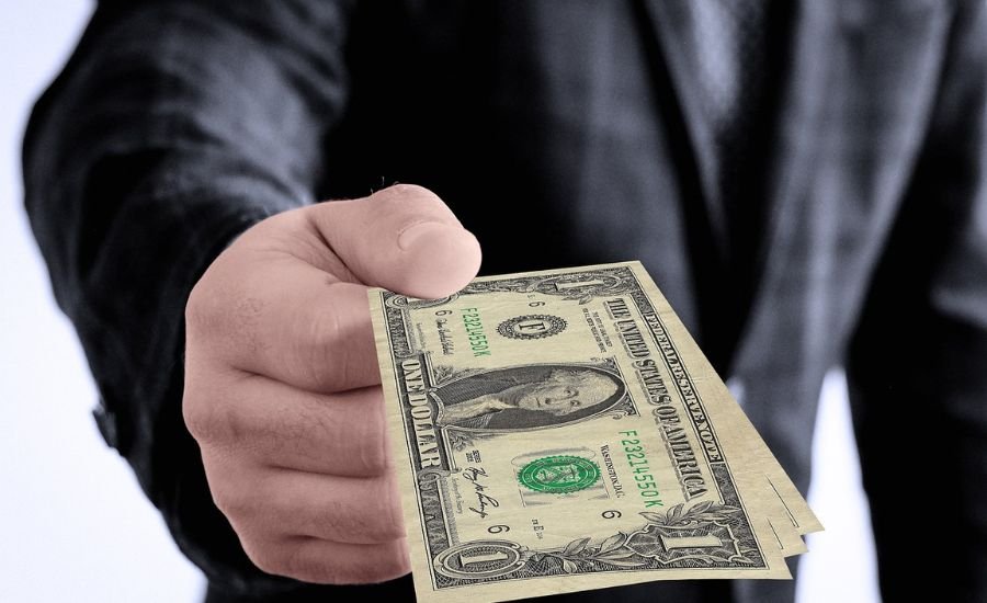 handing over money handing over money