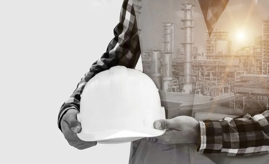 chemical and petroleum industry shown on the clothes of a worker chemical and petroleum industry shown on the clothes of a worker