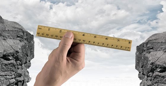 transfer pricing being shown as a ruler between two ledges