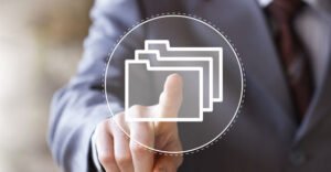 finger pointing at a digital folder representing digital tax files