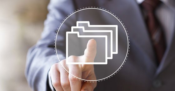 finger pointing at a digital folder representing digital tax files