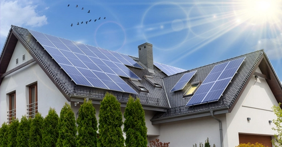 building with solarpanels on the roof for green energy building with solarpanels on the roof for green energy