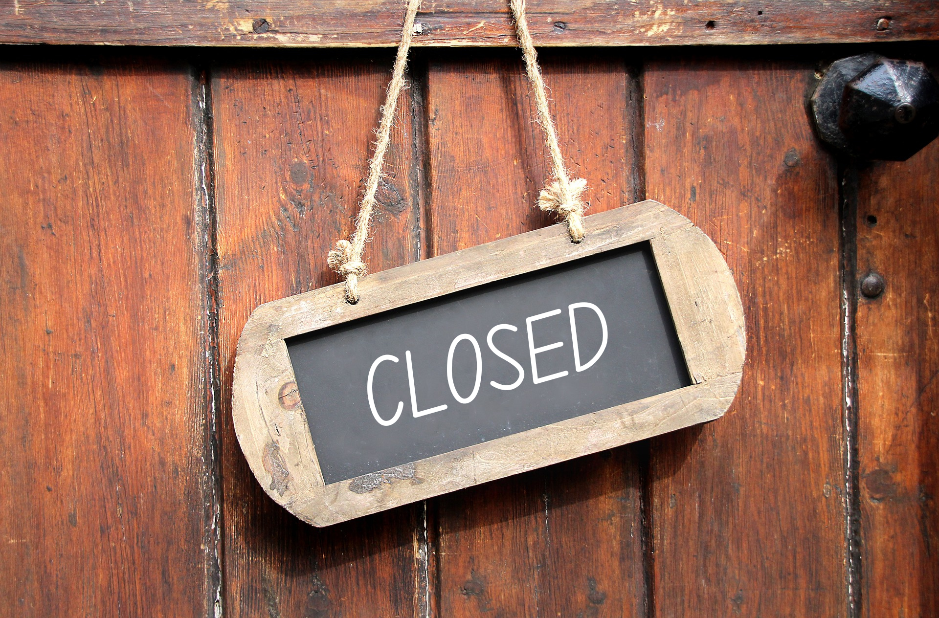 CLOSED sign on the door