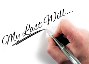 hand using a pen to write my last will