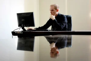 business man looking at his computer
