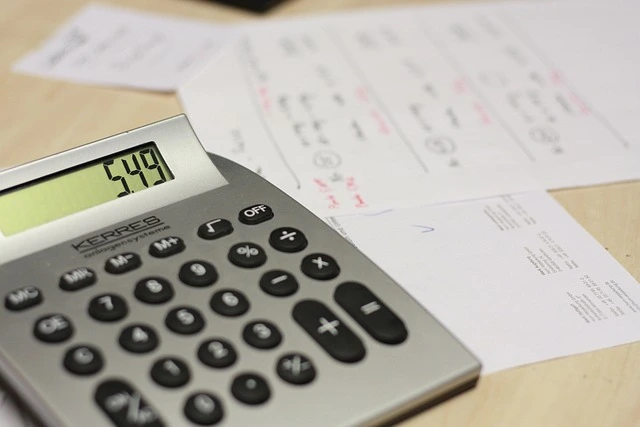 calculator-being-used-to-calculate-payroll-tax-deductions