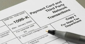 1099k tax form with a pen on top