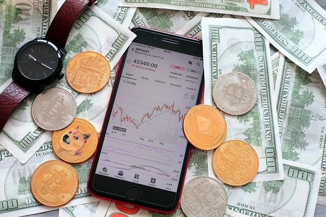 cryptocurrency-trading-showing-a-mobile-phone-with-candlestick-charts-and-fiat-cash-around-along-wit cryptocurrency trading showing a mobile phone with candlestick charts and fiat cash around along with crypto coins