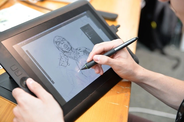 digital artist working on a tablet