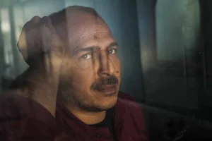 man stressed about tax liabilities