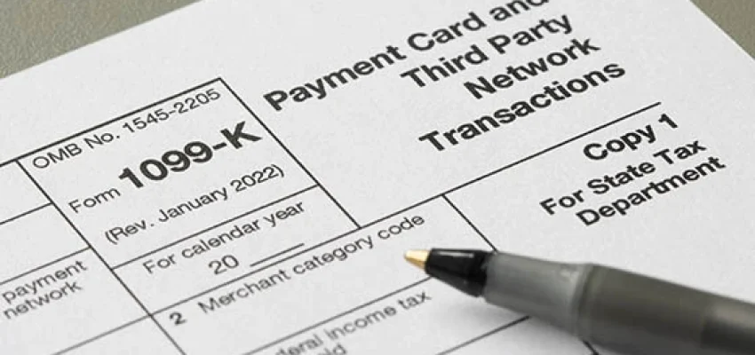 1099k tax form with a pen on top