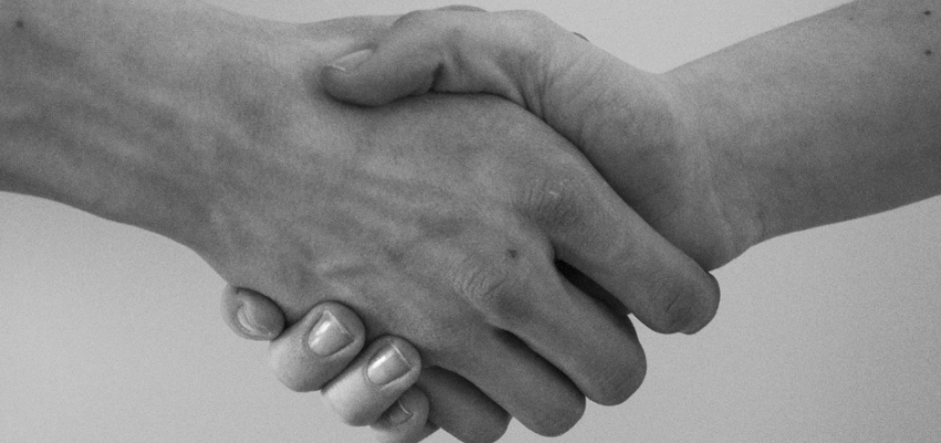 Agreement between two nation shown as a handshake