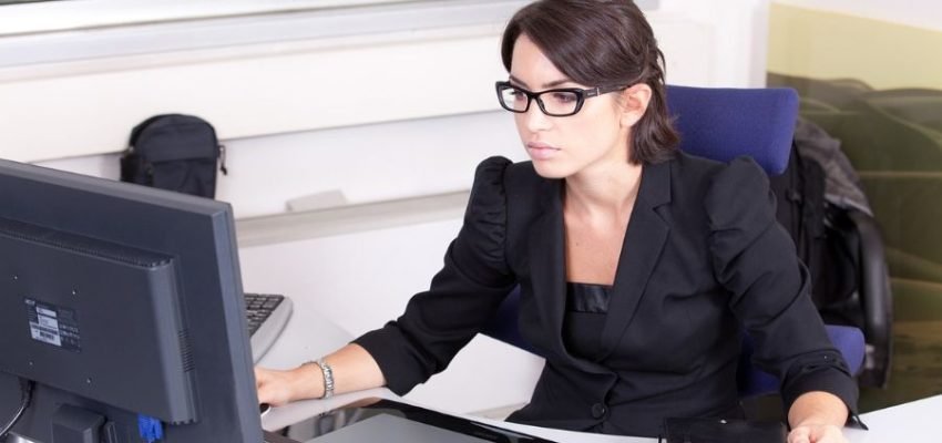 accountant looking at her computer