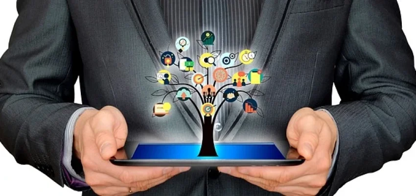 branding shown as a tree with many parts coming out of a tablet held by a man