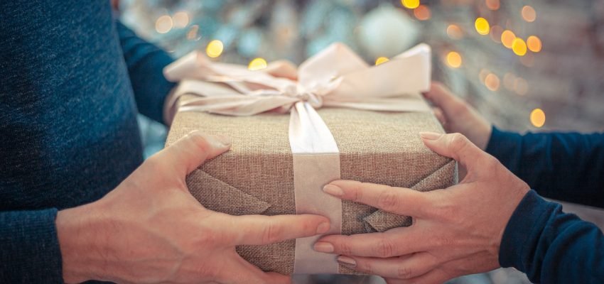 gift being given from giver to recipient