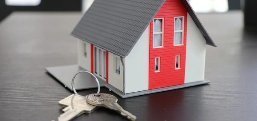 model of a house and keys showing ownership