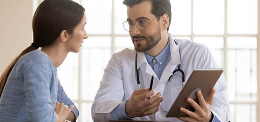 patient speaking to a doctor