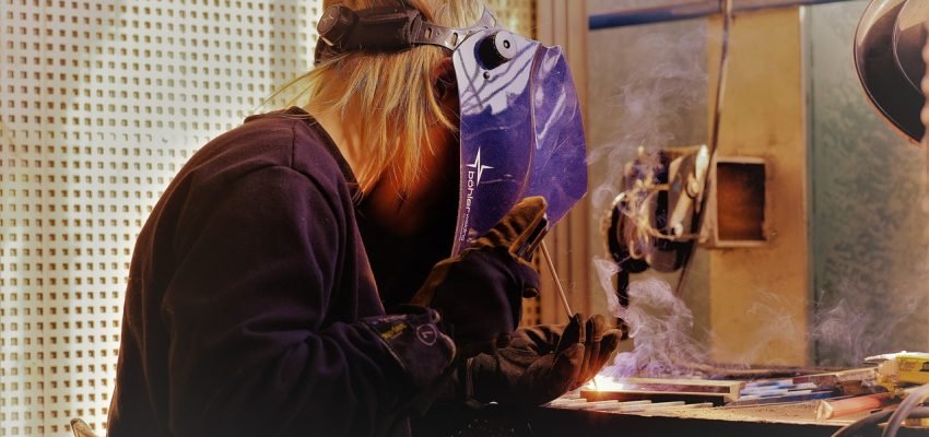 student welding in a vocational school