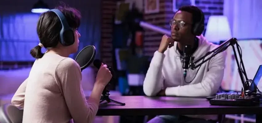 two podcasters in their studio