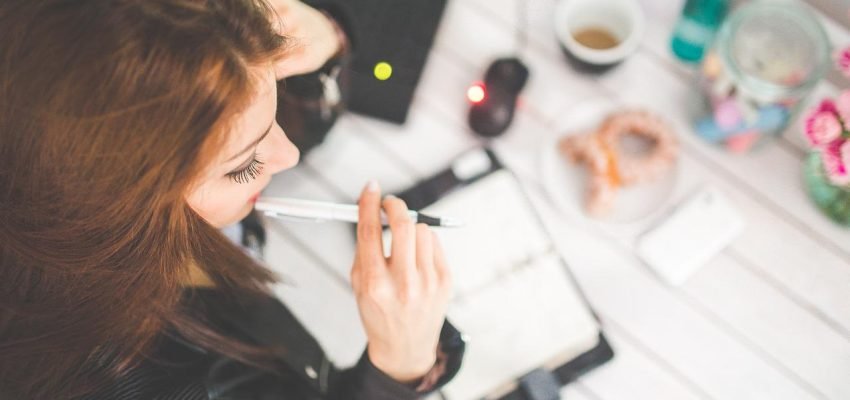 woman thinking about getting help from a tax advisor